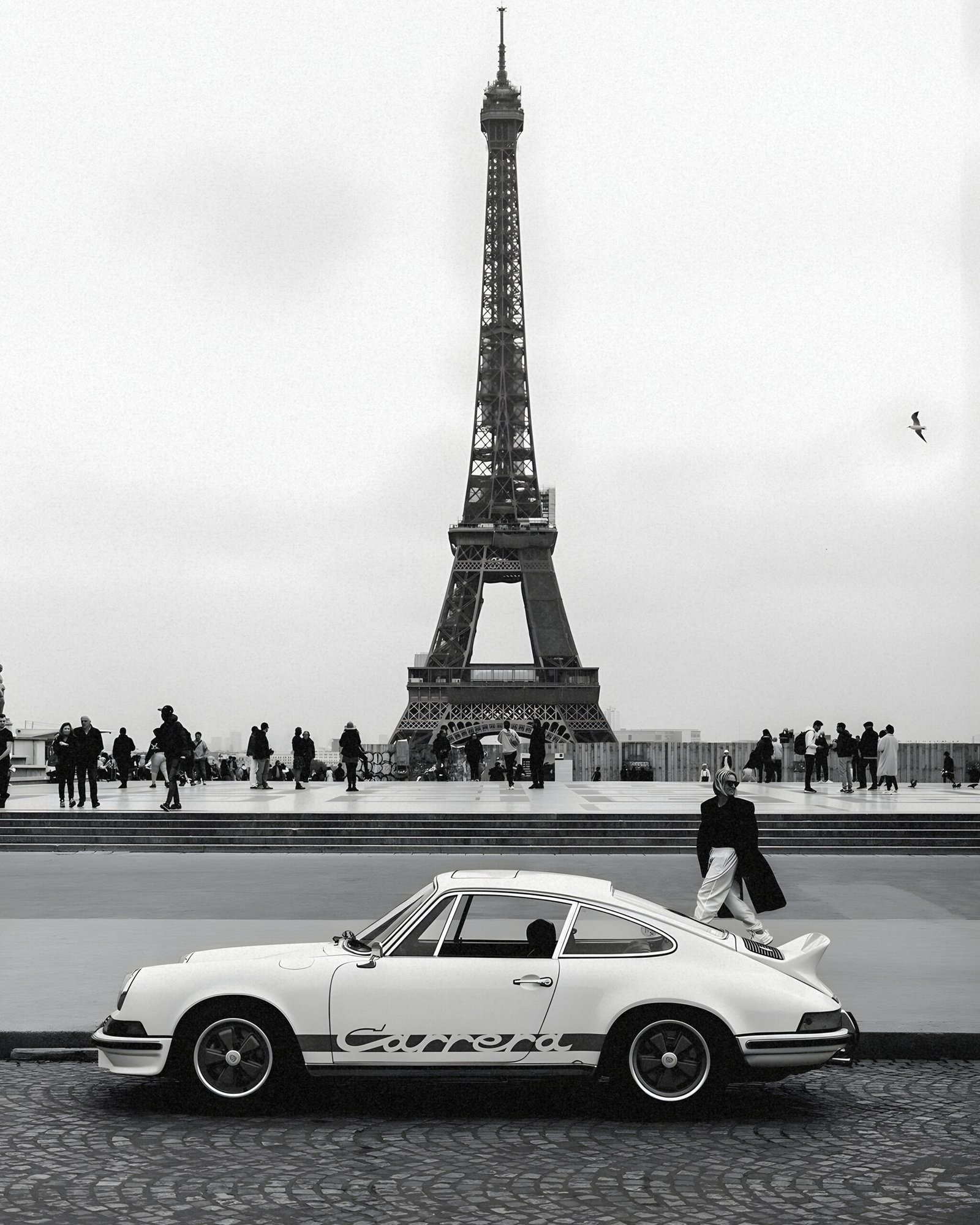 A refined black and white Porsche 911 wall art print set in Paris with the Eiffel Tower. Museum-quality matte finish designed for elevated, modern interiors. A refined black and white Porsche 911 wall art print set in Paris with the Eiffel Tower. Museum-quality matte finish designed for elevated, modern interiors.