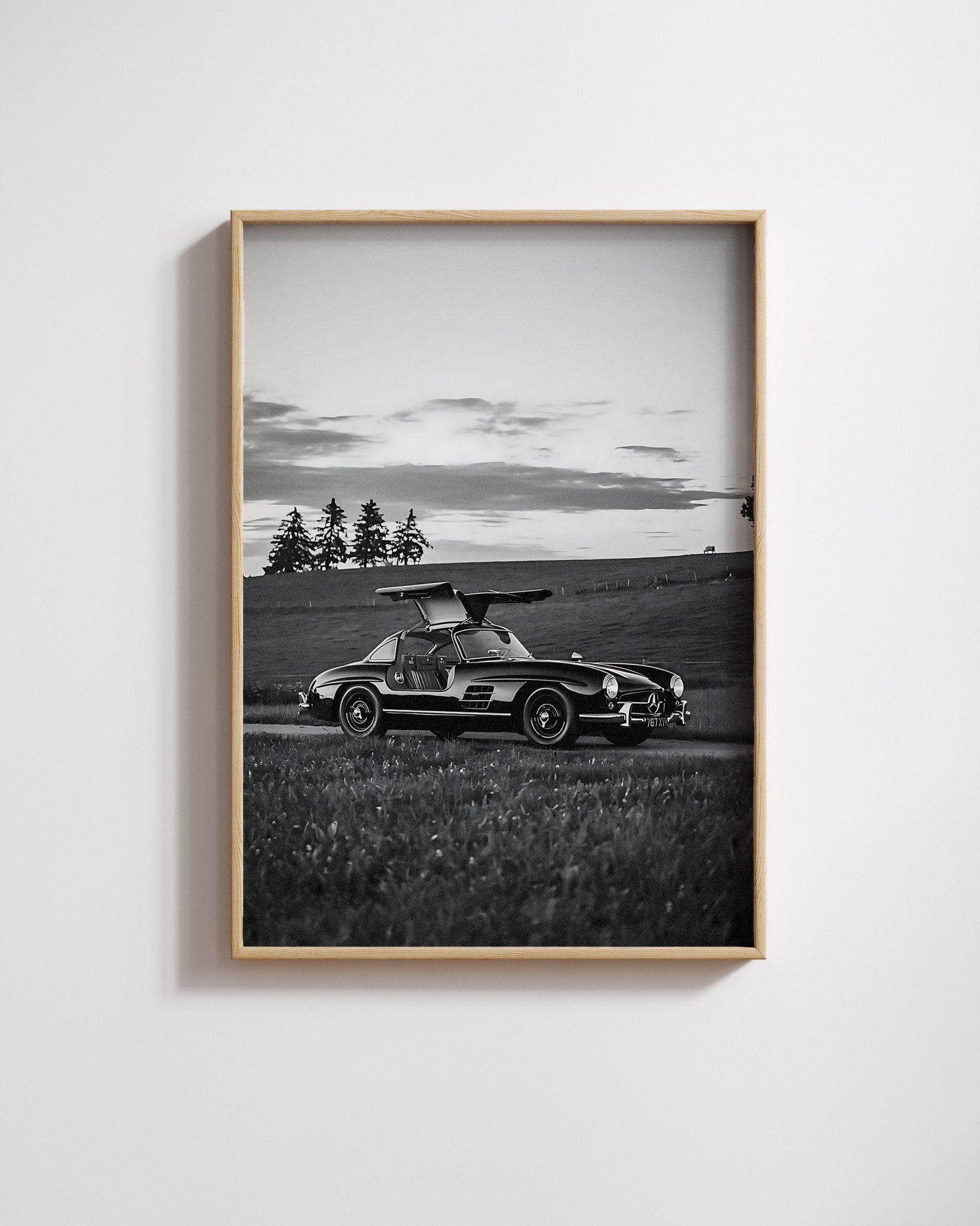Black and white poster of Mercedes-Benz 300SL Gullwing with iconic upward-opening doors, fine art automotive print by Montclair Collective