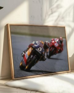 Vintage motorcycle racing poster of 1990s rider leaning into apex