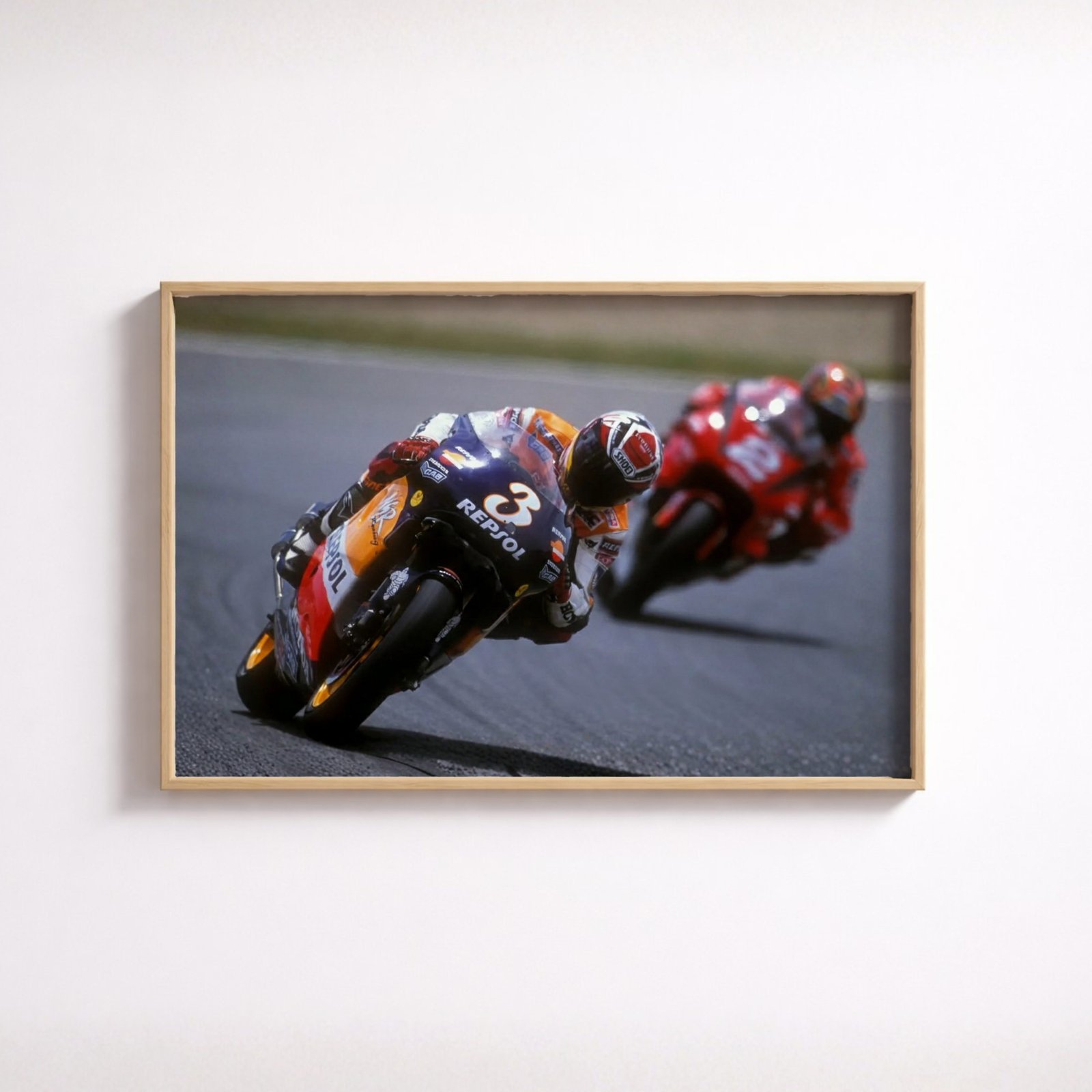 Vintage motorcycle racing poster of 1990s rider leaning into apex