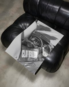 in-race cockpit portrait of Clay Regazzoni driving Ferrari Formula One car during Grand Prix
