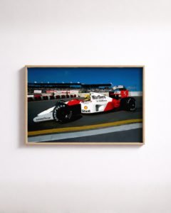 Full colour print of Ayrton Senna driving McLaren Formula One car during 1991 season