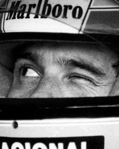Close-up of the museum-quality 200 gsm matte paper texture and crisp print details of the Ayrton Senna Formula 1 portrait.