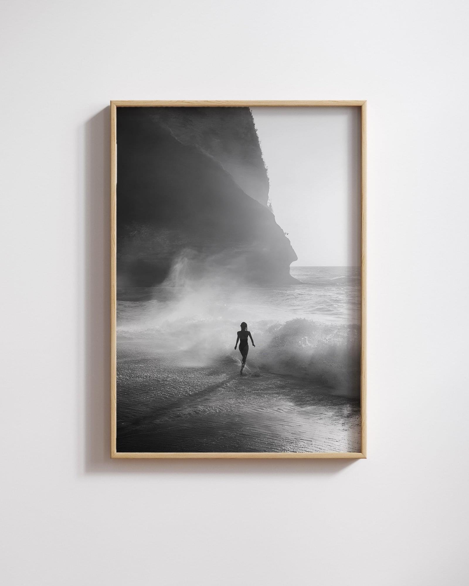 woman running along coast poster for living room, surf-inspired wall art for office, black and white coastal poster